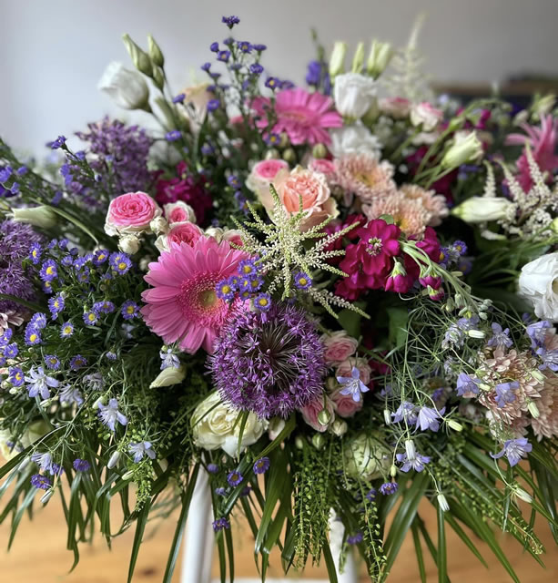 Costs for flowers more elaborate wedding around £1,500